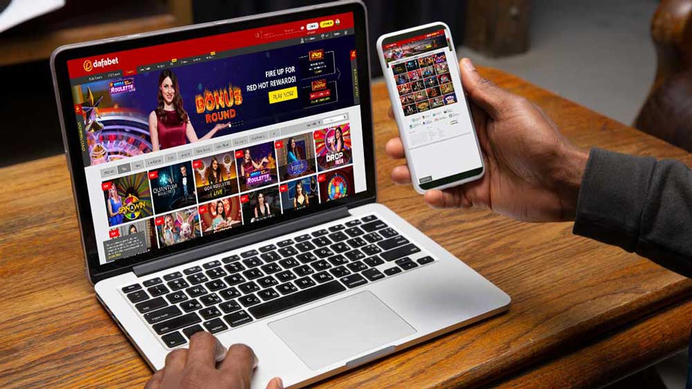 man playing online casino games at dafabet